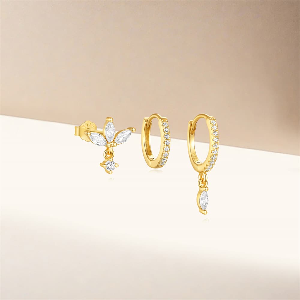 Sára – Cercei delicate din aur cu o mișcare subtilă.